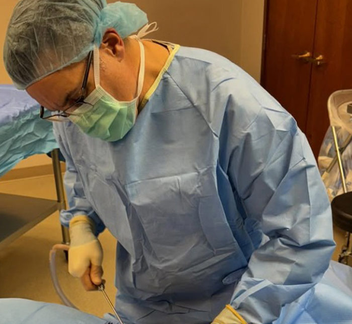 Dr. John Trupiano during surgery at Trupiano Plastic Surgery